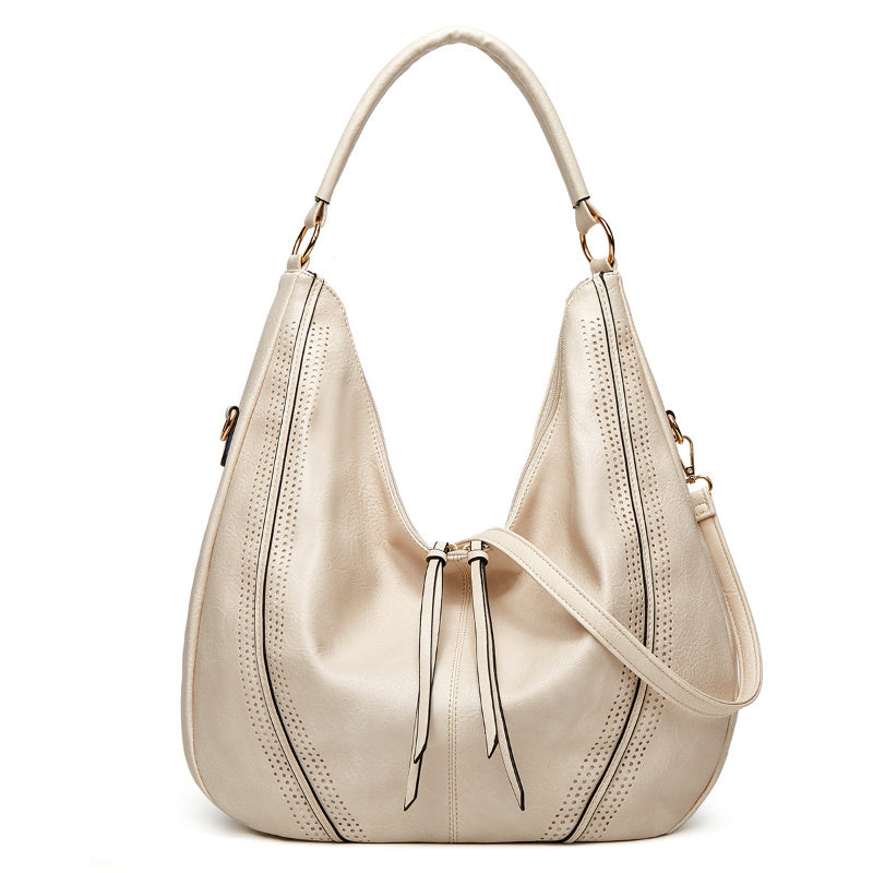 Retro Tassel Hollow Shoulder Tote – Large Capacity Casual Bag for Women