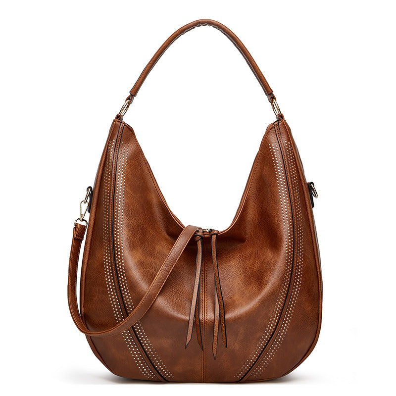 Retro Tassel Hollow Shoulder Tote – Large Capacity Casual Bag for Women